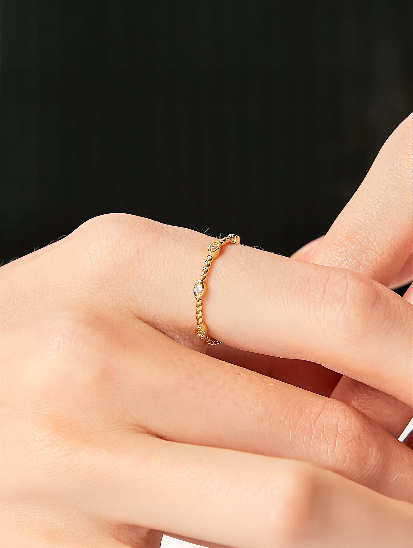 Minimalist Twist Band Cubic Zirconia Ring