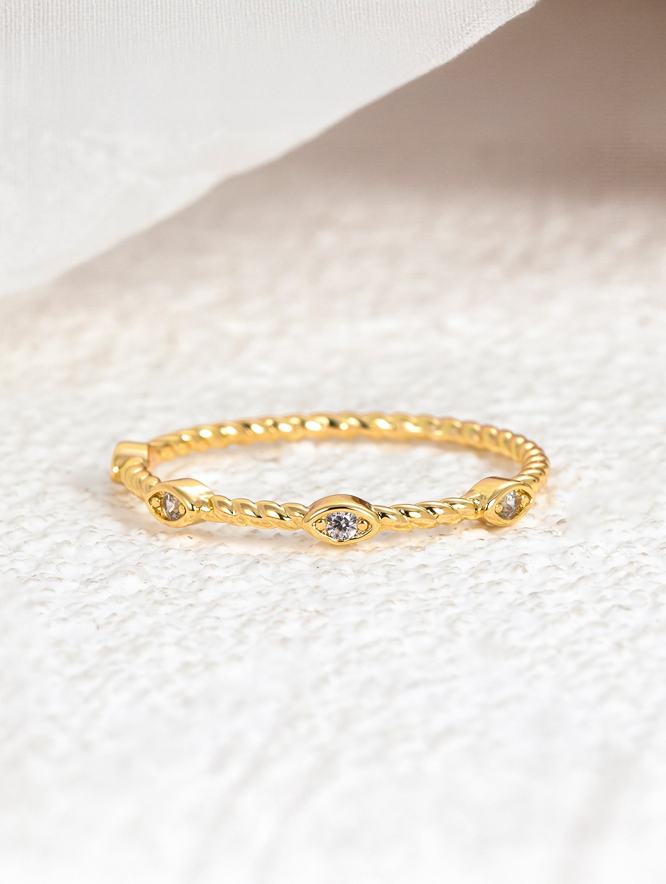 Minimalist Twist Band Cubic Zirconia Ring